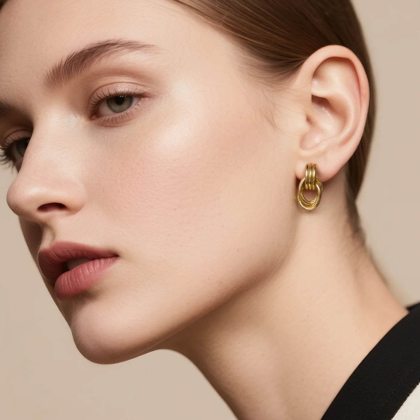 Gold 3D Knot Statement Earrings lifestyle image