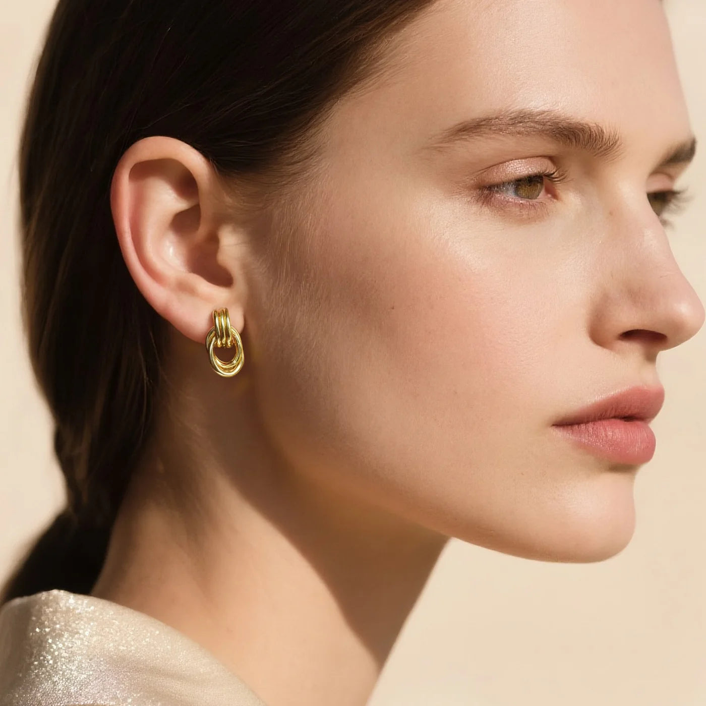 Gold 3D Knot Statement Earrings lifestyle image