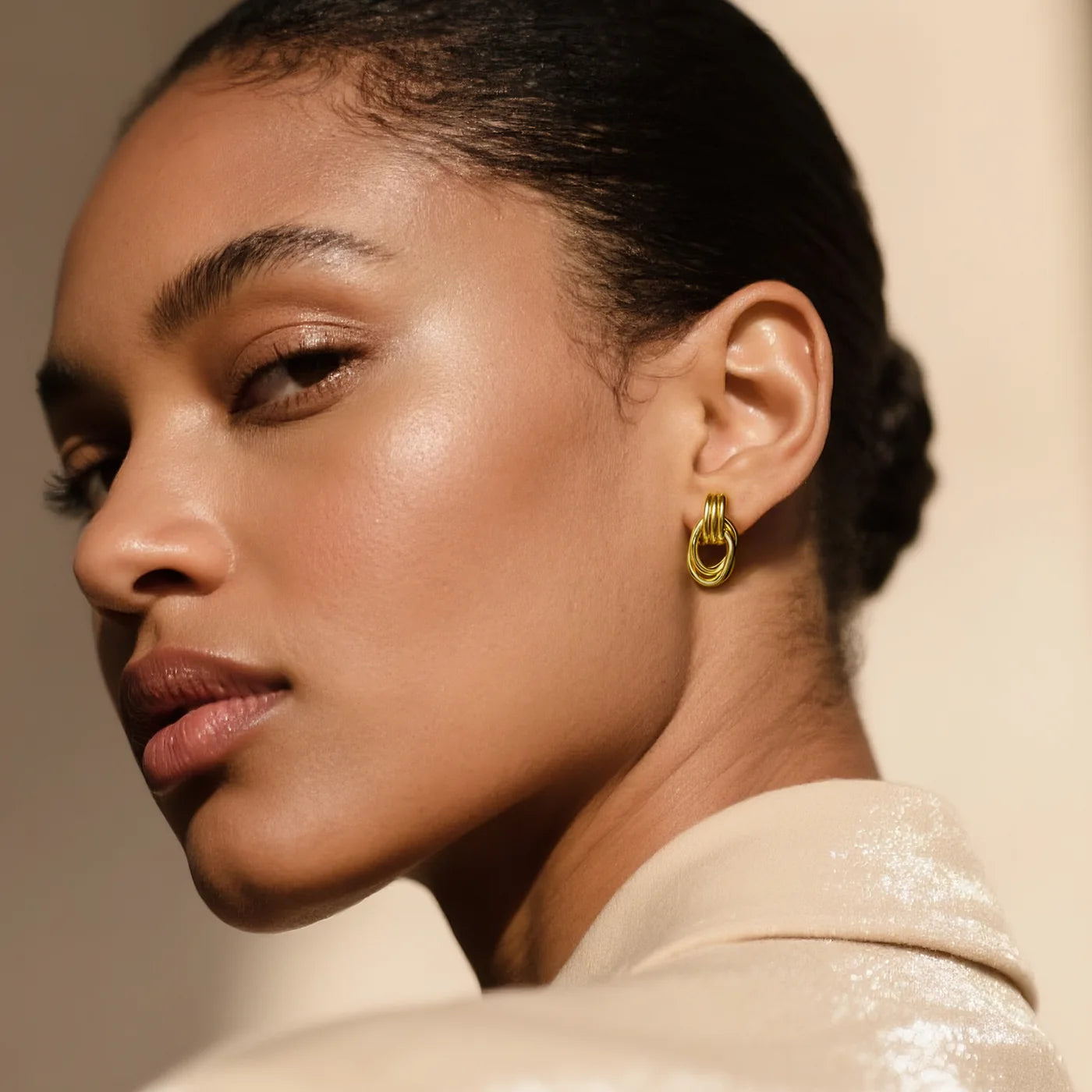Gold 3D Knot Statement Earrings lifestyle image