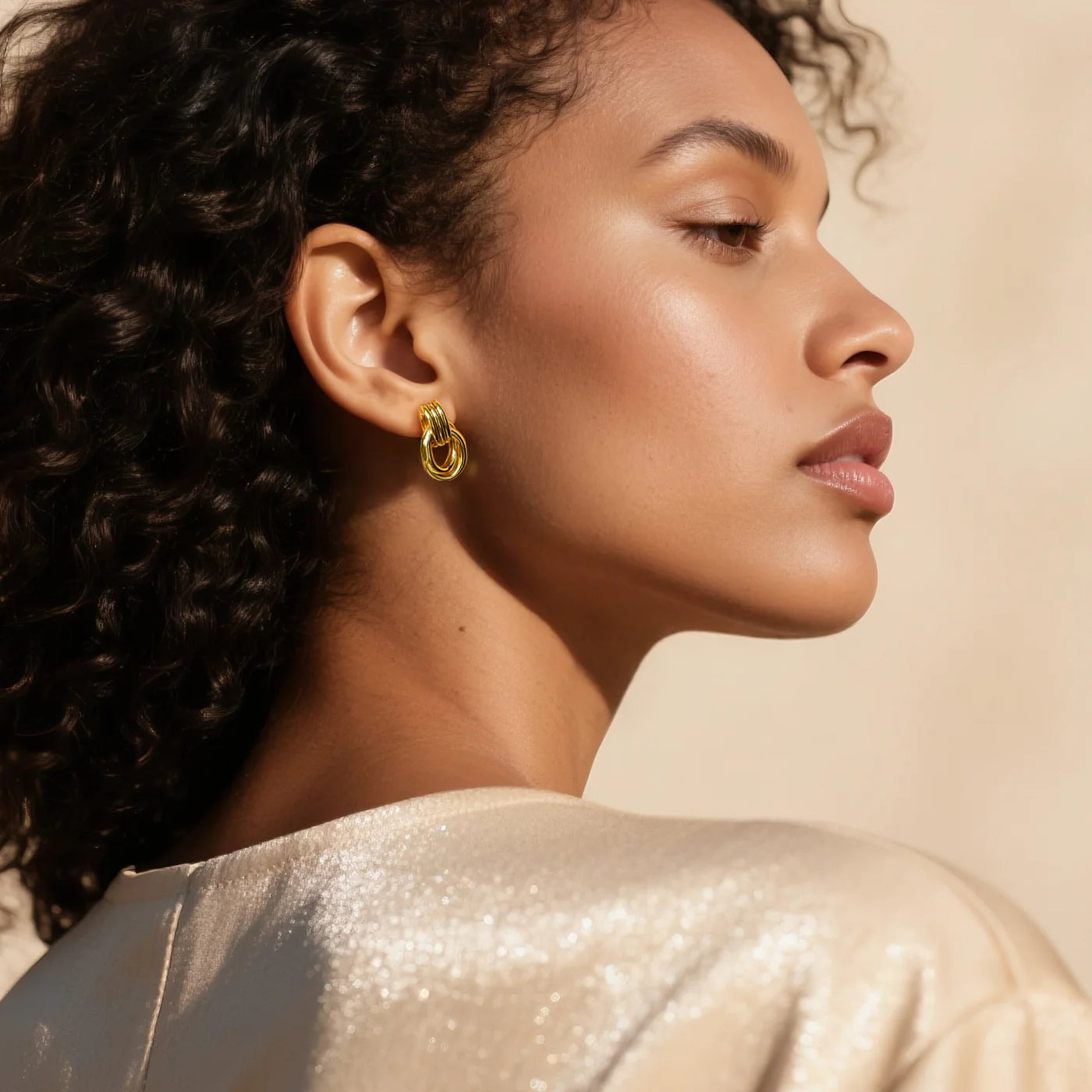 Gold 3D Knot Statement Earrings lifestyle image