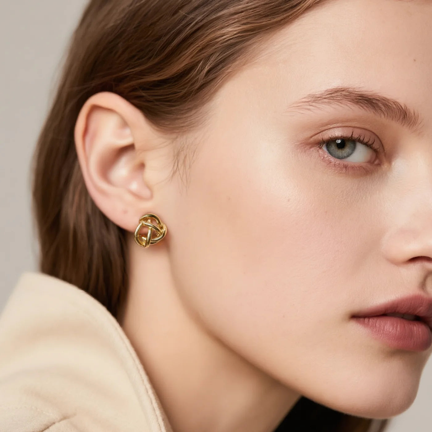 Woven Knot Gold Stud Earrings lifestyle image