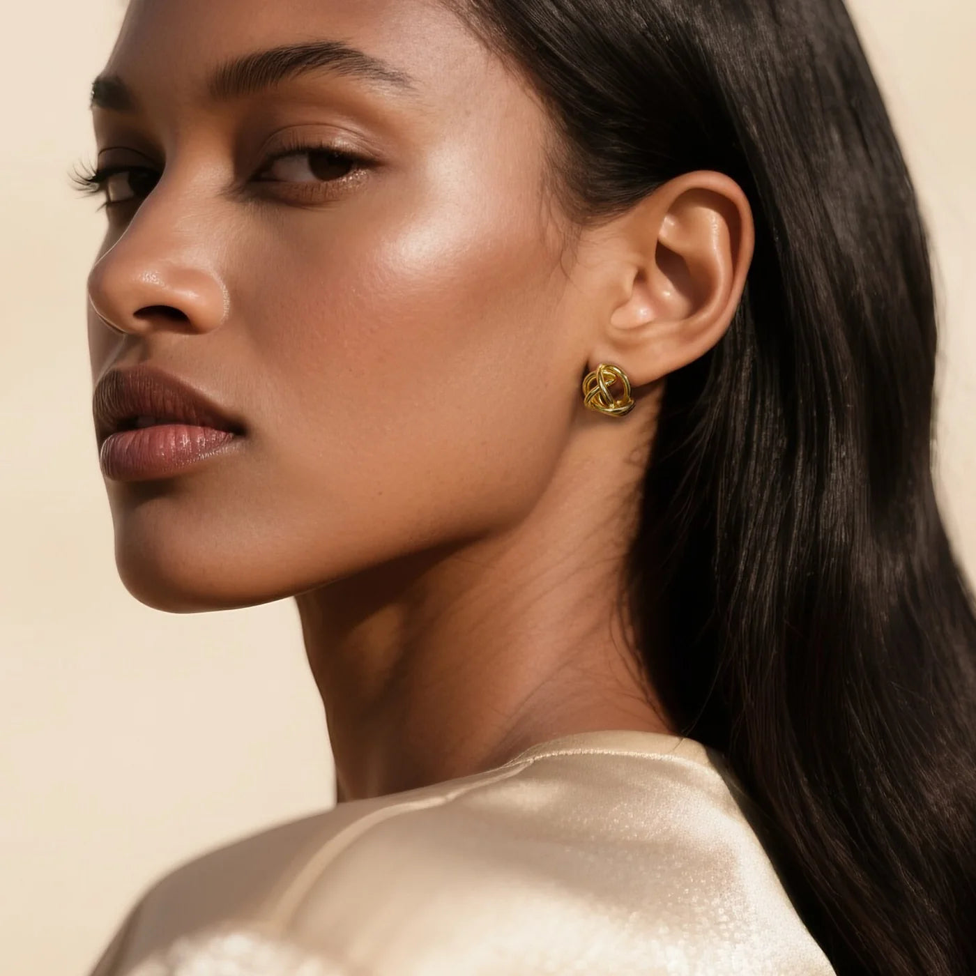 Woven Knot Gold Stud Earrings lifestyle image