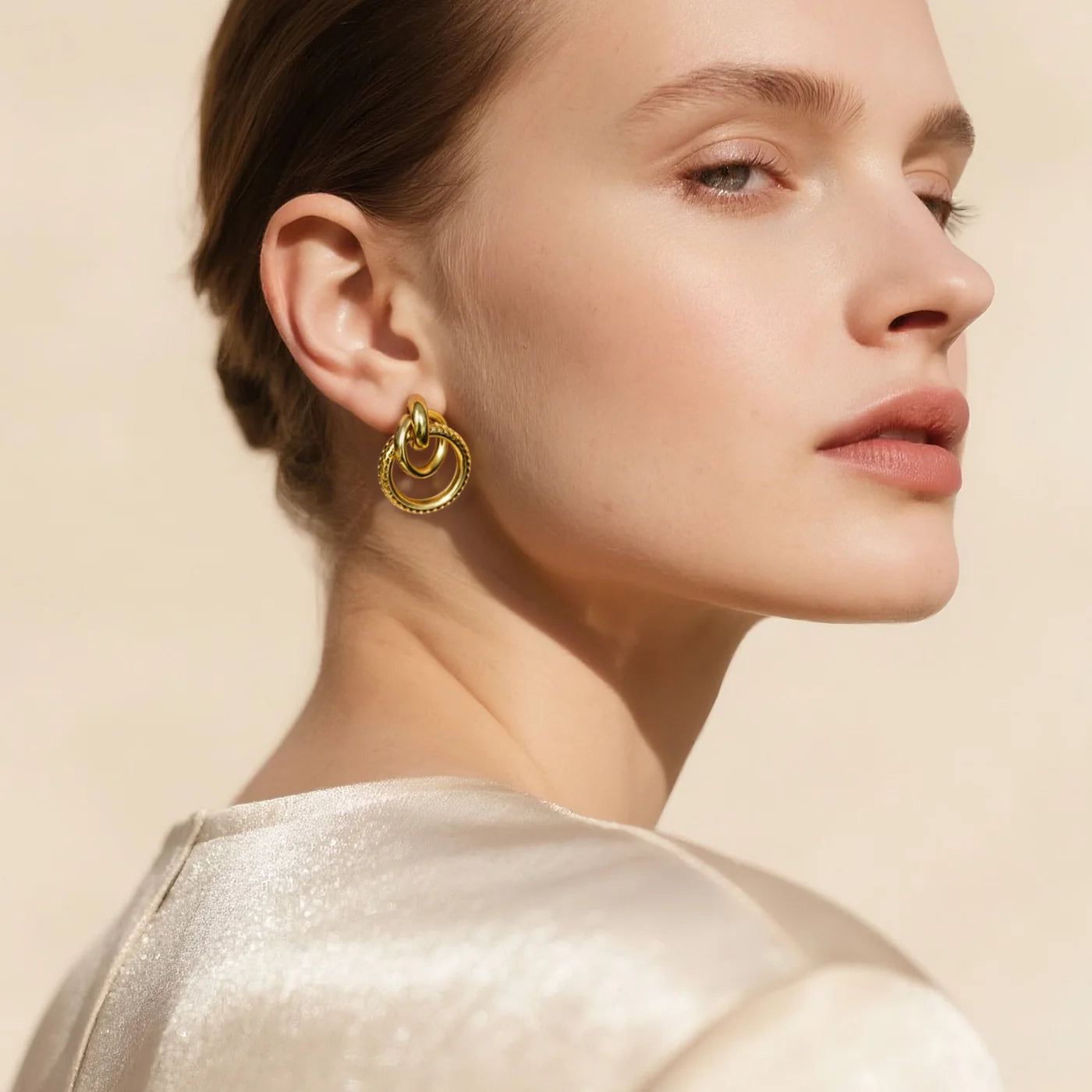 Interlocking Gold Hoop Earrings lifestyle image