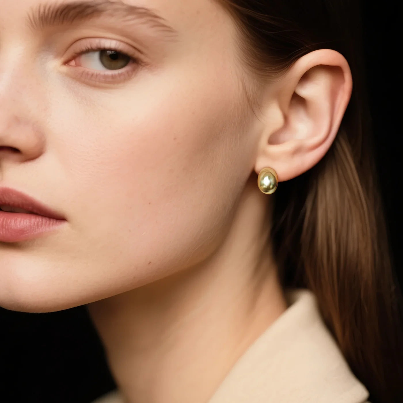 Gold Oval Stud Earrings lifestyle image
