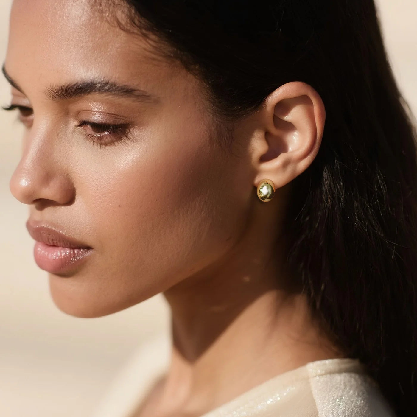Gold Oval Stud Earrings lifestyle image