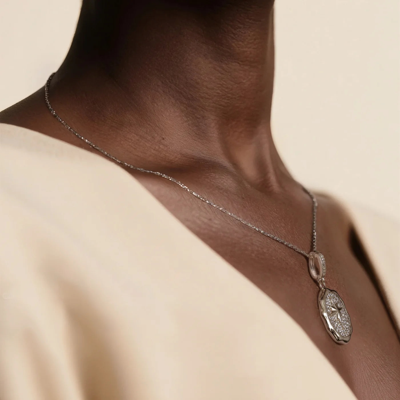 Silver Starburst Medallion Necklace lifestyle image